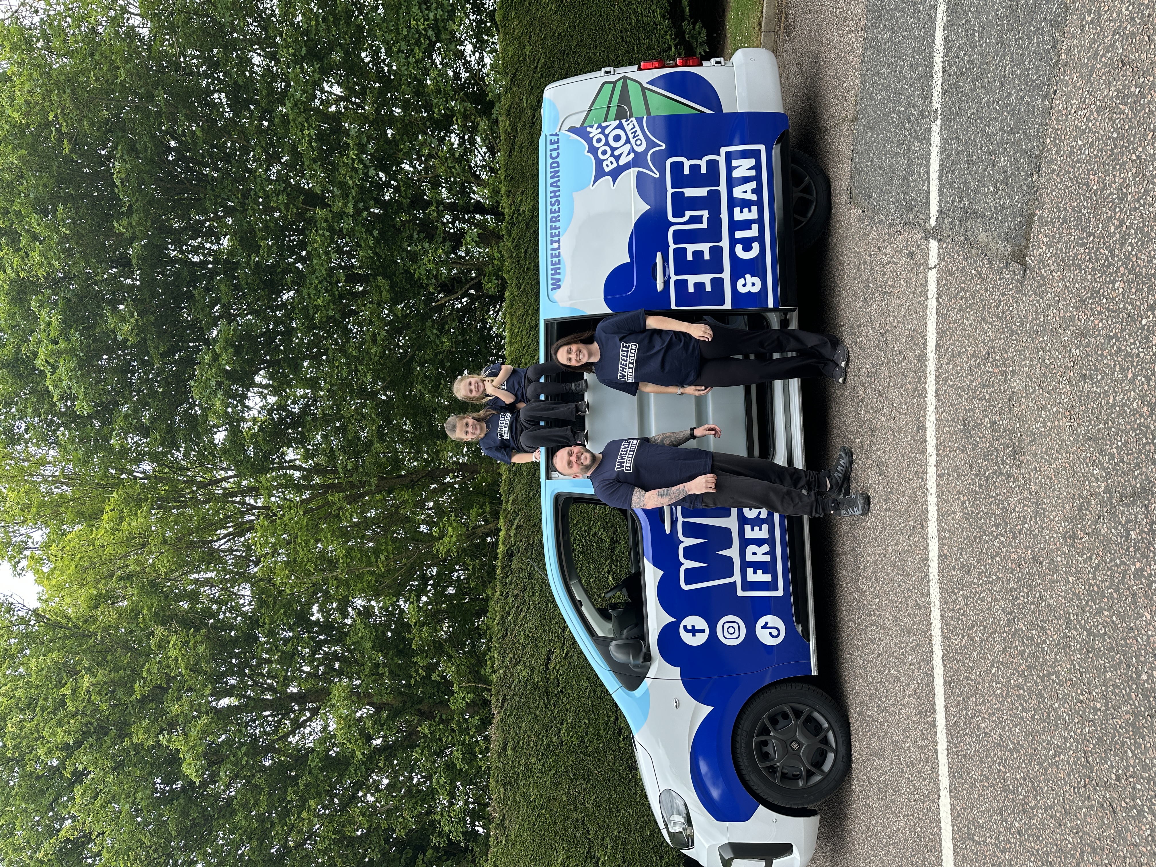 The Wheelie Fresh & Clean family with their branded van